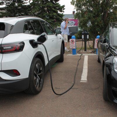 A vehicle getting a charge at the Grand Marais City Hall in August. Photo by Rhonda Silence