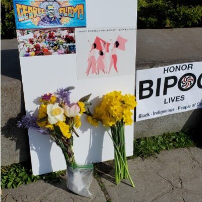 Flowers at the temporary George Floyd Memorial in Harbor Park on May 25, 2021. Photo by Rhonda Silence