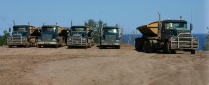 Trucks parked in a gravel pit during a past Highway 61 construction project. File photo Rhonda Silence