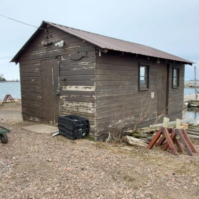 The future location of a small fish house that is used by North Superior Fisheries for net and equipment storage is yet unknown, but North House assures the fishermen that they will have storage space. 