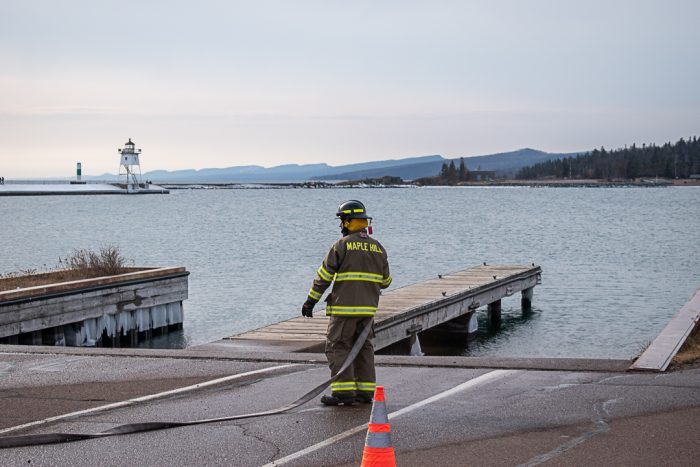 Twelve volunteer firefighters participate in firefighting training over weekend