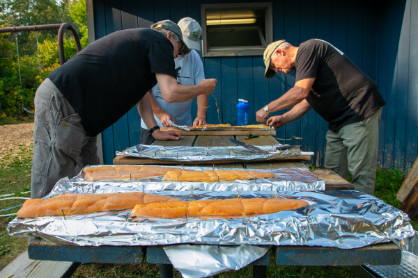 Fish Planking in Grand Marais at the Cook County Historical Society's event captured by M Baxley