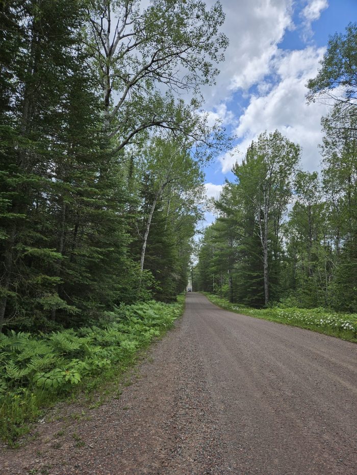 Dry conditions delay grading operations on county gravel roads