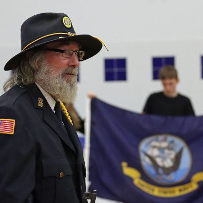 U.S. Navy veterans stand to be honored