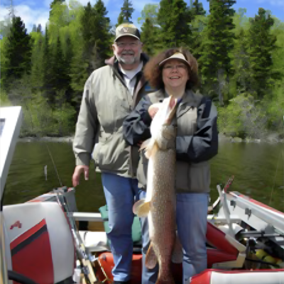 Jim and wife Deb with a large pike