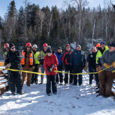 Sharon Hexum-Platzer cutting 'ribbon'