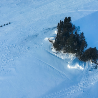 Musher passing an island