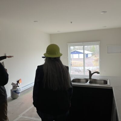 in the kitchen of a one bedroom apartment