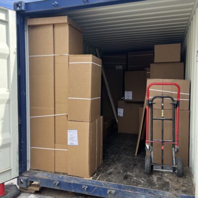 Storage units in the parking lot contain kitchen cabinets ready to be installed. Photo by Kirsten Wisniewski