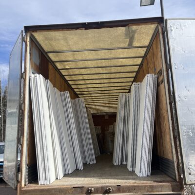 A semi-truck containing windows and closet doors waits in the Birchwood parking lot. Photo by Kirsten Wisniewski