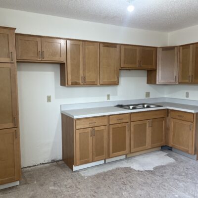 Completed kitchen cabinet installation in a vacant unit. Photo by Kirsten Wisniewski