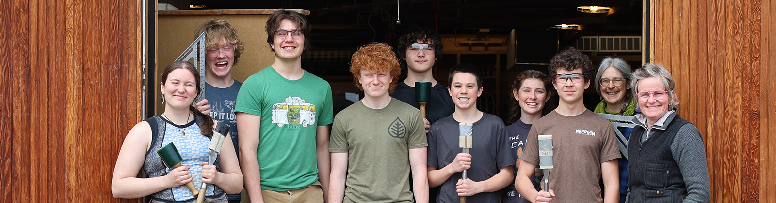 High school students build timber frame swingsets for Cook County