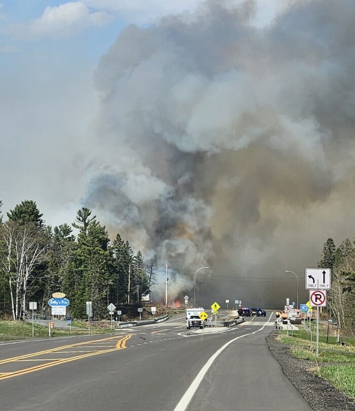 Fire crews responding to wildfire near Two Harbors, leading to closure of Highway 61