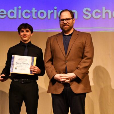 Valedictorian Georgi Dimitrov and Principal Josh Belanger. Photo by Michael McHugh