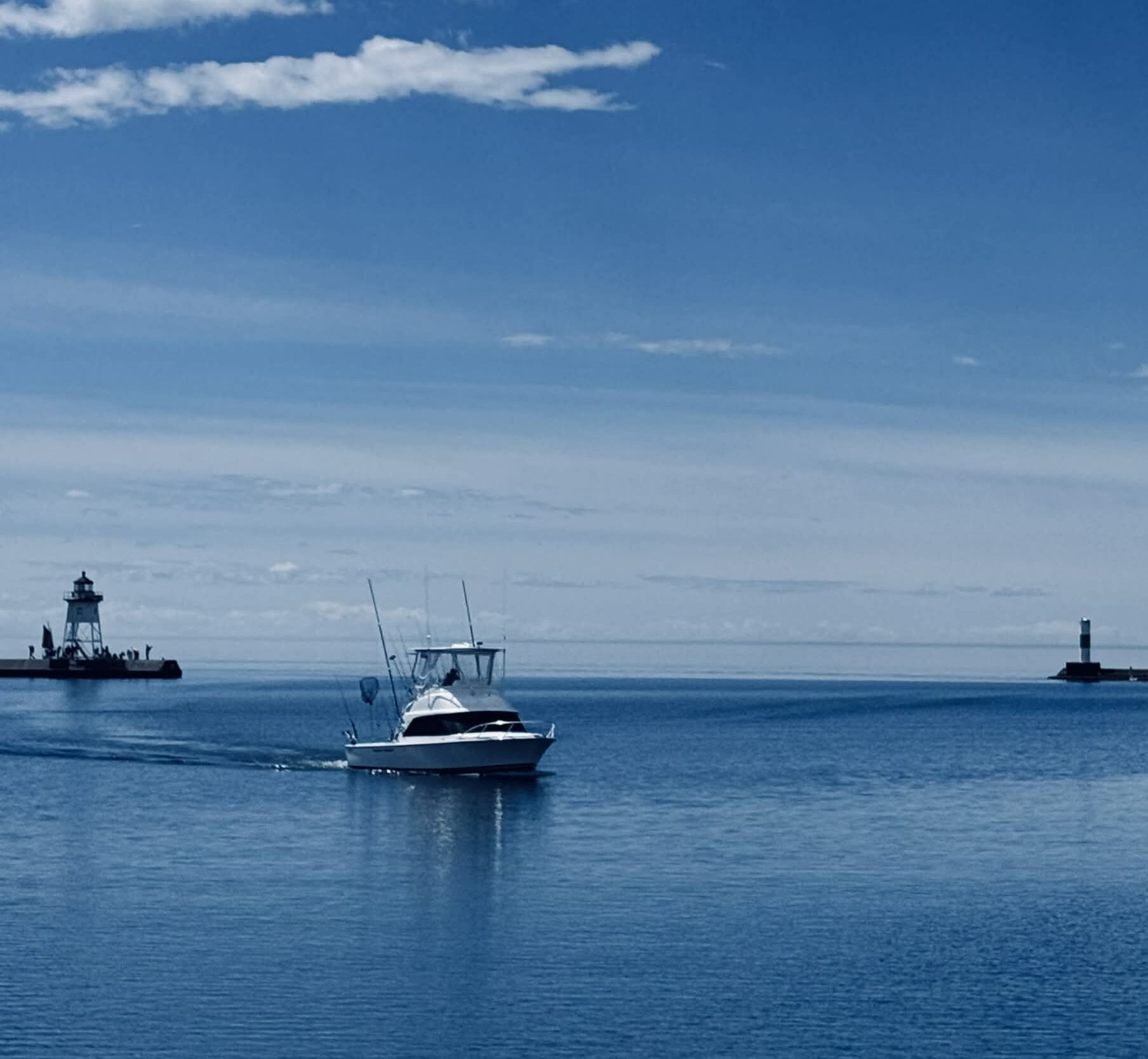 Local fishing charter captains and crew rescue kayaker on Lake Superior